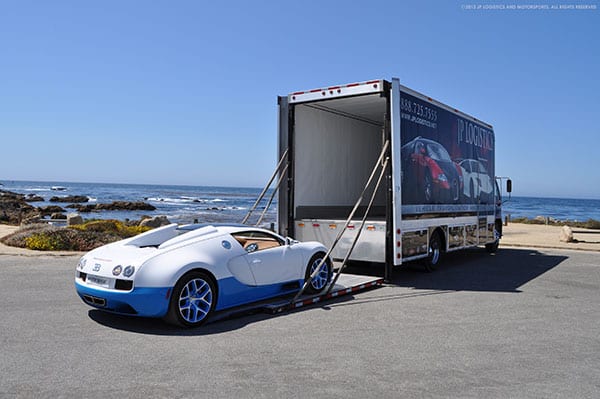 luxury enclosed single auto transport